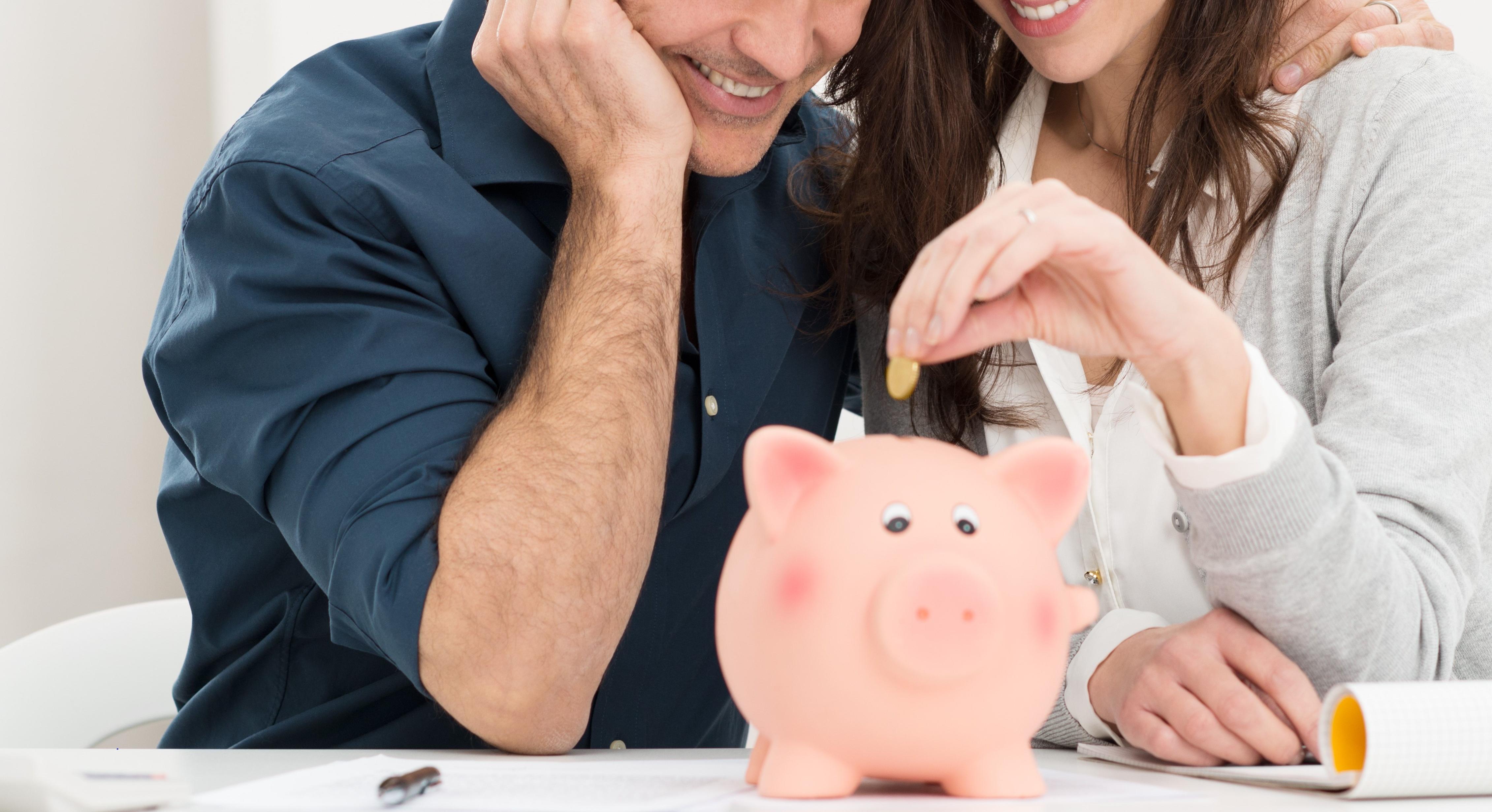 Couple with piggy bank