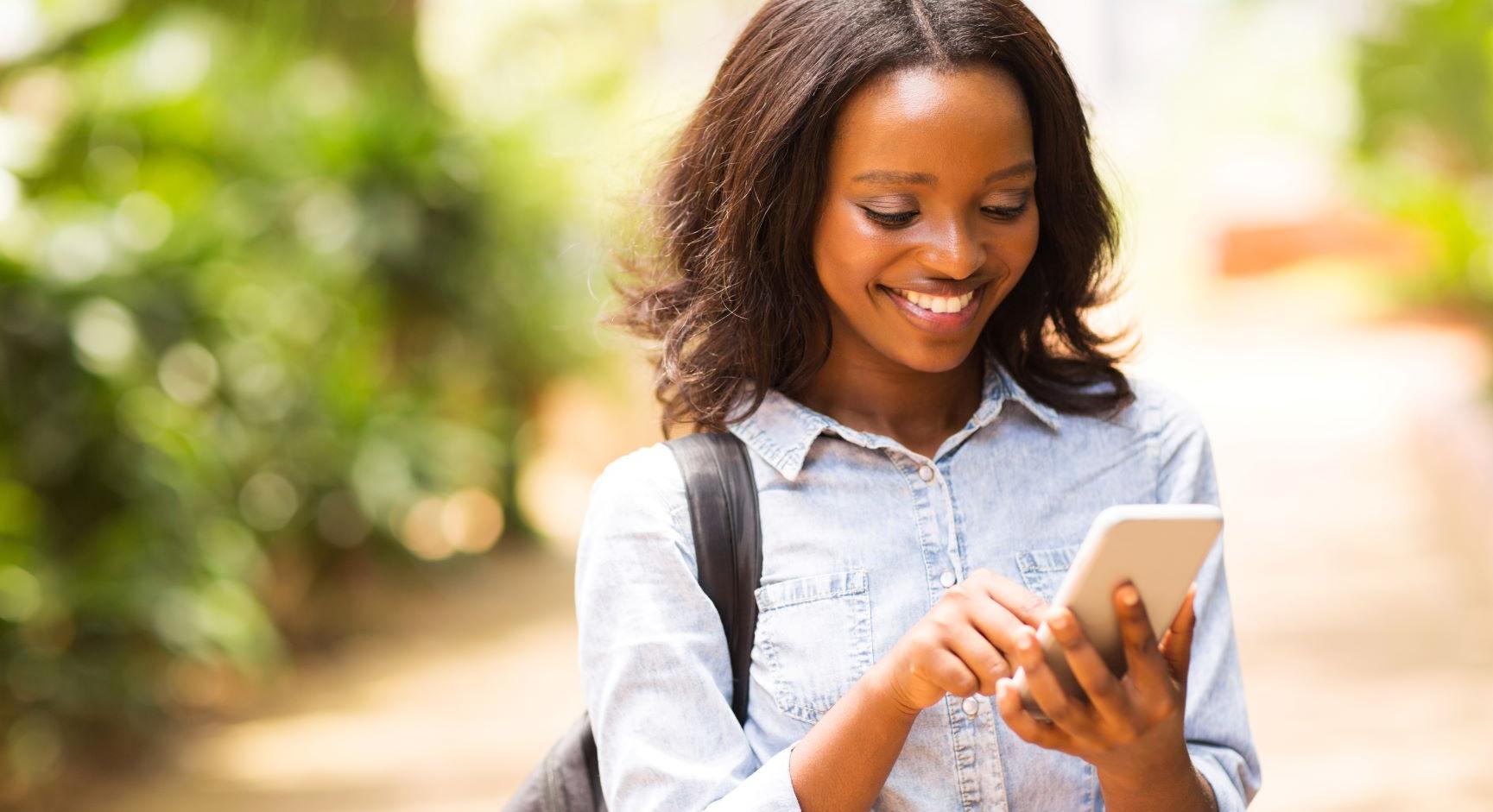 Young African American Women with phone